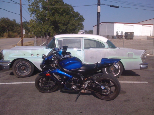 80a Your bike next to a car from the 60s.JPG