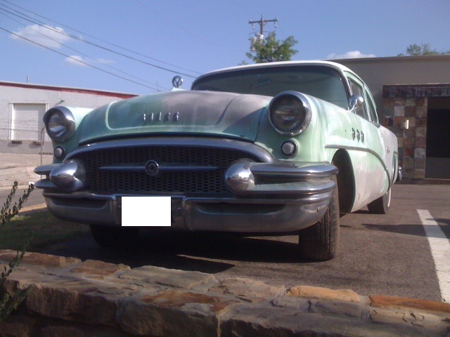 80b Your bike next to a car from the 60s.JPG